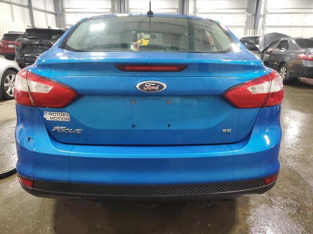 1FAHP3F25CL283030 - 2012 FORD FOCUS SE BLUE photo 6