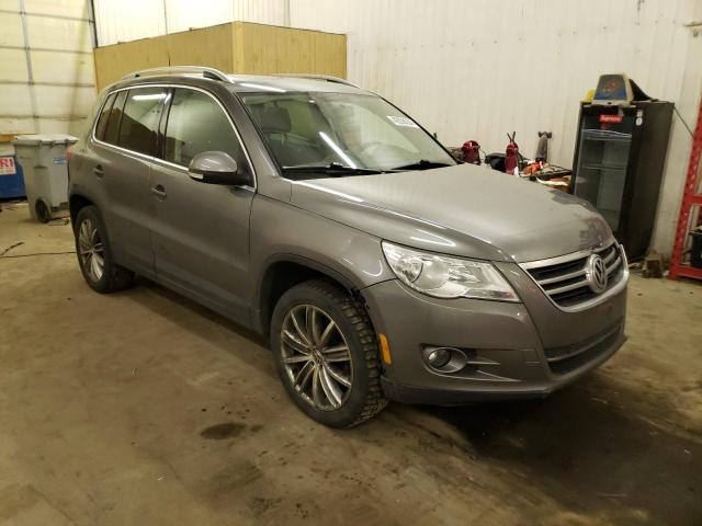 WVGBV7AX0BW518183 - 2011 VOLKSWAGEN TIGUAN S BROWN photo 4