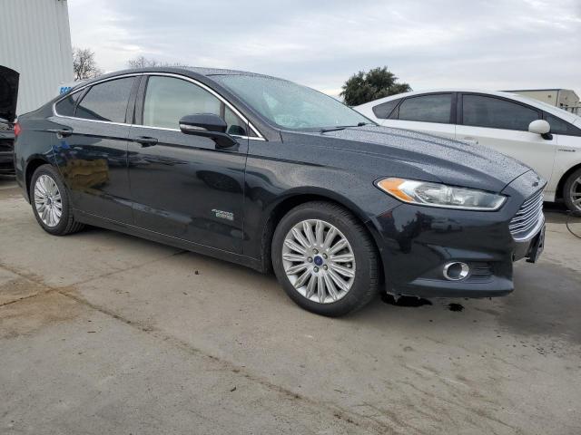 3FA6P0PU7FR173785 - 2015 FORD FUSION SE PHEV BLACK photo 4