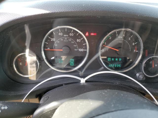 1C4BJWEG6EL138288 - 2014 JEEP WRANGLER U SAHARA WHITE photo 9