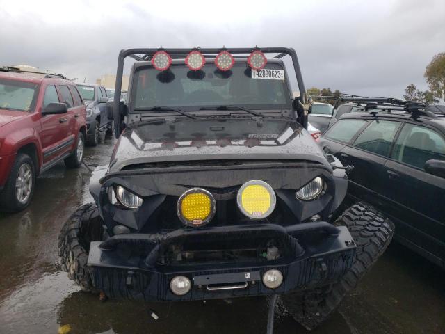 1C4HJWDG2JL916009 - 2018 JEEP WRANGLER U SPORT Чорний фото 5