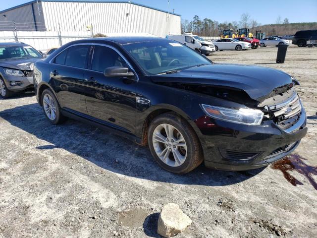 1FAHP2D88HG142728 - 2017 FORD TAURUS SE BLACK photo 4