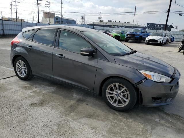 1FADP3K2XFL314507 - 2015 FORD FOCUS SE GRAY photo 4