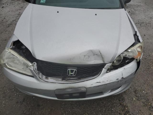 1HGEM21535L002719 - 2005 HONDA CIVIC LX SILVER photo 11