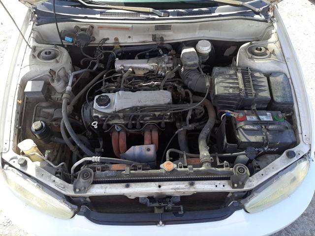 JA3AY11A62U034772 - 2002 MITSUBISHI MIRAGE DE WHITE photo 11