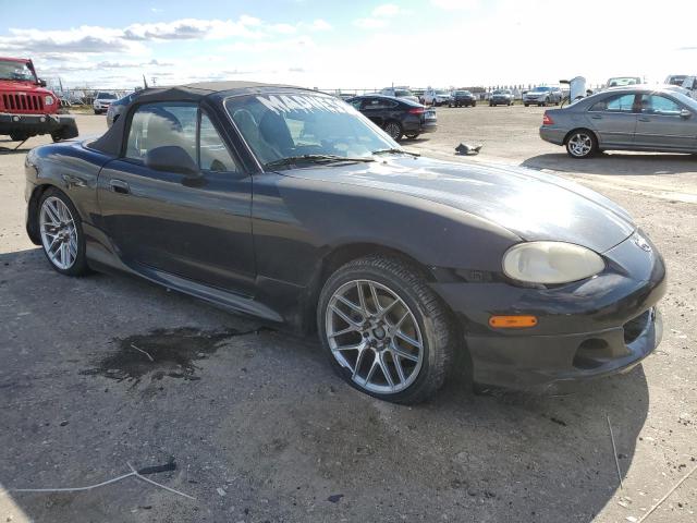JM1NB353720225829 - 2002 MAZDA MX-5 MIATA BASE BLACK photo 4
