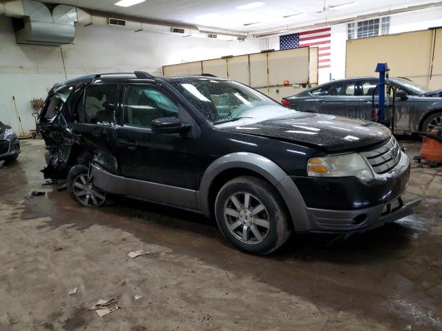 1FMDK05W59GA02514 - 2009 FORD TAURUS X SEL BLACK photo 4