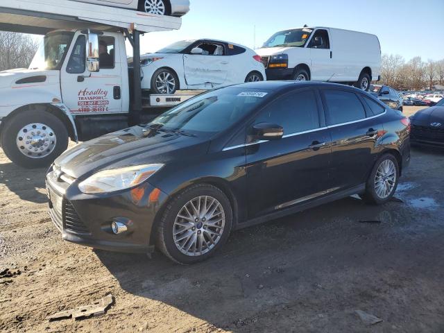 1FAHP3H27CL304568 - 2012 FORD FOCUS SEL BLACK photo 1