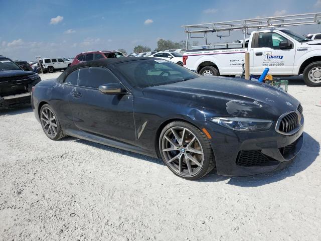 WBAFY4C06MCF28104 - 2021 BMW M850XI BLACK photo 4
