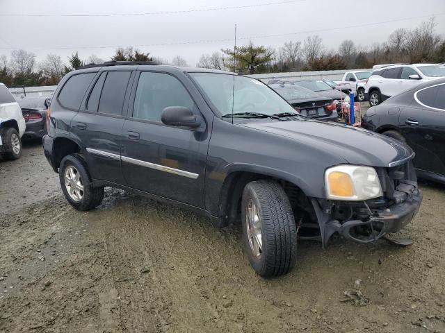 1GKDT33S292131752 - 2009 GMC ENVOY SLE BLACK photo 4