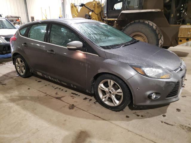 1FAHP3N27CL334948 - 2012 FORD FOCUS TITANIUM GRAY photo 4