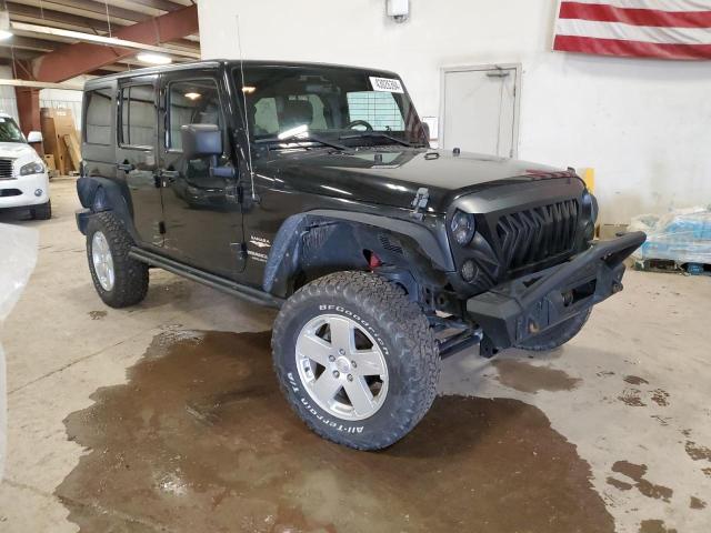 1C4BJWEG8CL262365 - 2012 JEEP WRANGLER U SAHARA BLACK photo 4