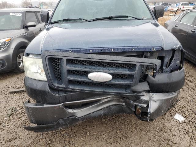 1FTRF12256NB22973 - 2006 FORD F150 BLUE photo 11