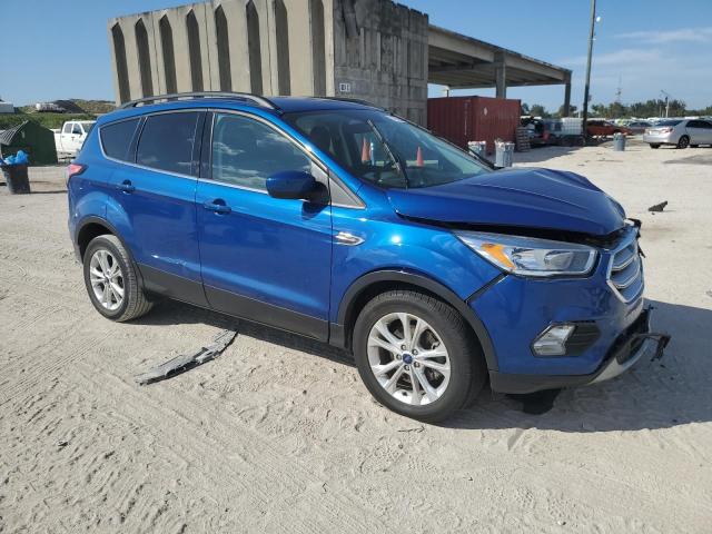 1FMCU0GD5JUB79832 - 2018 FORD ESCAPE SE BLUE photo 4