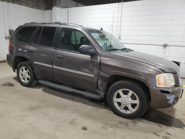 1GKDT13S882163558 - 2008 GMC ENVOY BROWN photo 4