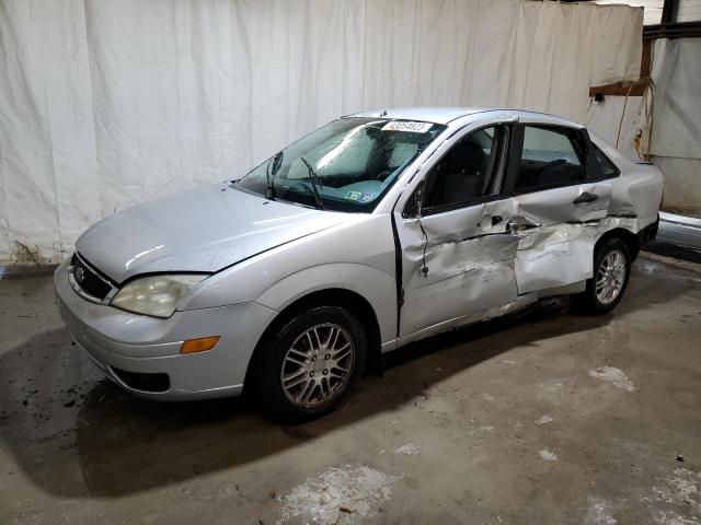 1FAFP34N05W137544 - 2005 FORD FOCUS ZX4 SILVER photo 1