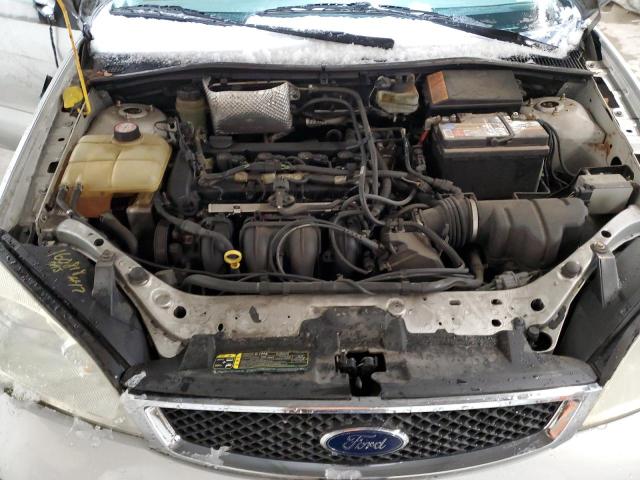 1FAFP34N05W137544 - 2005 FORD FOCUS ZX4 SILVER photo 11