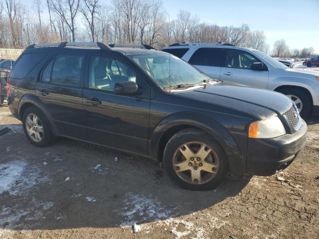 1FMDK06195GA33858 - 2005 FORD FREESTYLE LIMITED BLACK photo 4