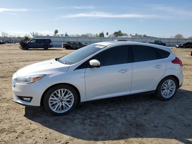 1FADP3N29JL249749 - 2018 FORD FOCUS TITANIUM WHITE photo 1