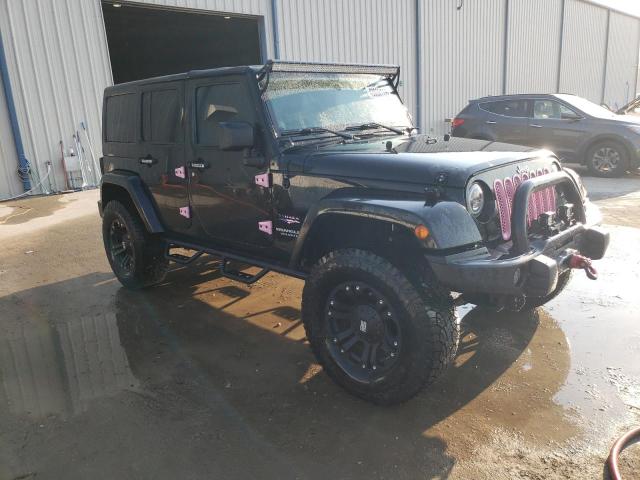 1C4BJWEG4DL655779 - 2013 JEEP WRANGLER U SAHARA BLACK photo 4