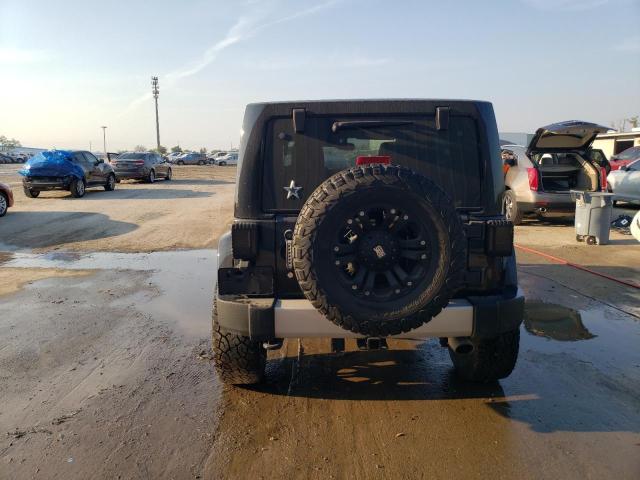 1C4BJWEG4DL655779 - 2013 JEEP WRANGLER U SAHARA BLACK photo 6