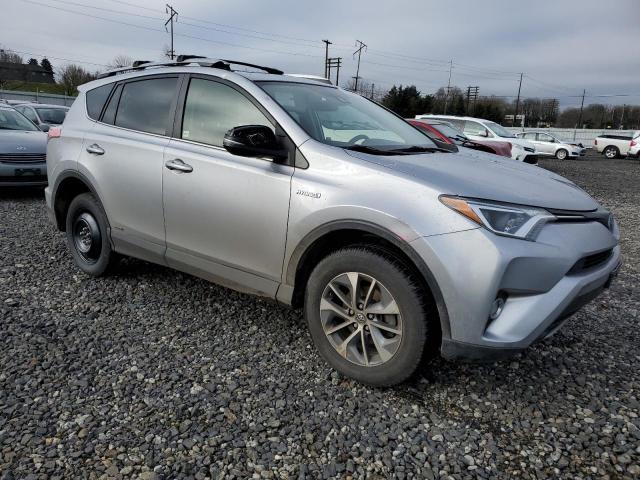 JTMRJREV9HD151033 - 2017 TOYOTA RAV4 HV LE SILVER photo 4