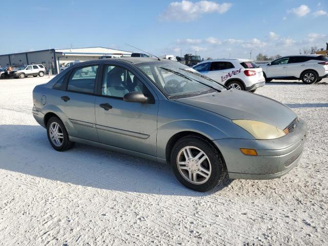 1FAFP34394W142450 - 2004 FORD FOCUS SE C GREEN photo 4