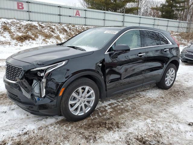 1GYAZAR49PF104137 - 2023 CADILLAC XT4 LUXURY BLACK photo 1