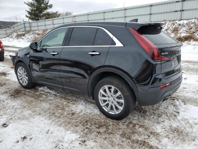 1GYAZAR49PF104137 - 2023 CADILLAC XT4 LUXURY BLACK photo 2