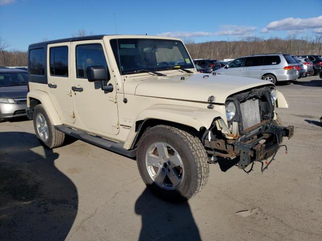 1J4HA5H1XBL598264 - 2011 JEEP WRANGLER U SAHARA BEIGE photo 4