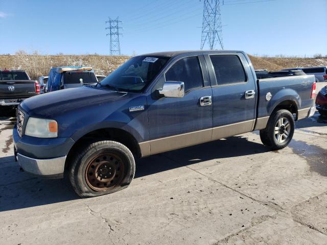 1FTPW14575KB82610 - 2005 FORD F150 SUPERCREW BLUE photo 1