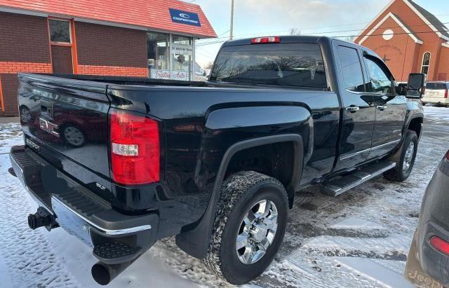 1GT22TEY0HZ233676 - 2017 GMC SIERRA K2500 SLT BLACK photo 4