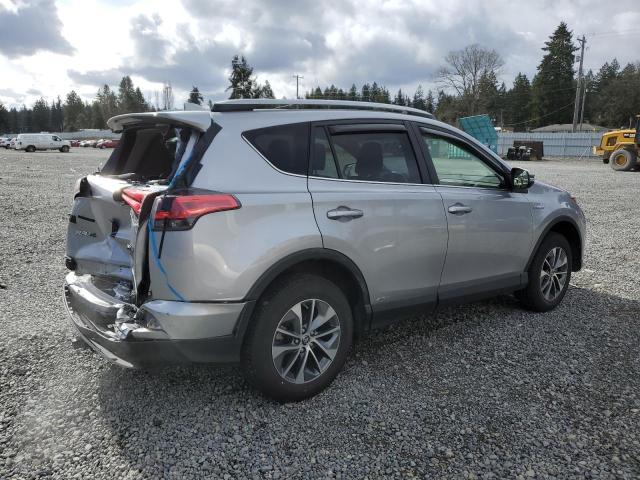 JTMRJREV2JD211241 - 2018 TOYOTA RAV4 HV LE SILVER photo 3