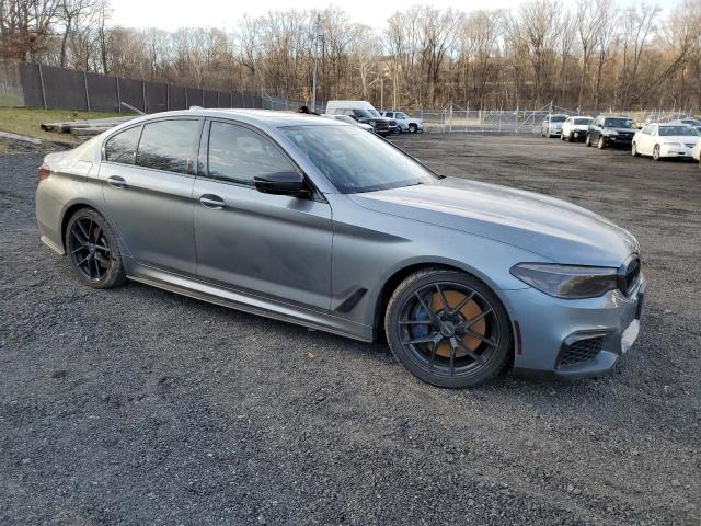 WBAJB9C53KB288904 - 2019 BMW M550XI SILVER photo 4