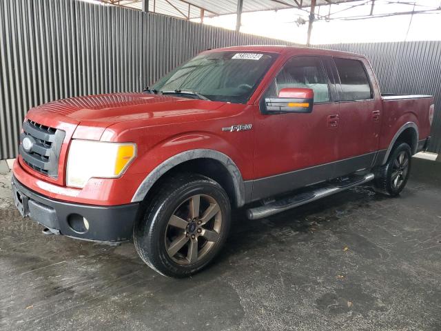 1FTPW14V89FA91585 - 2009 FORD F150 SUPERCREW RED photo 1