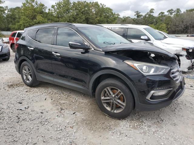 5NMZU3LB4HH050132 - 2017 HYUNDAI SANTA FE S BLACK photo 4