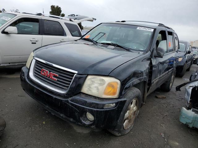 1GKDT13S322478422 - 2002 GMC ENVOY BLACK photo 1