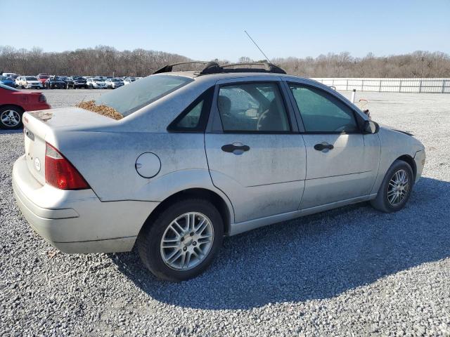 1FAFP34N77W323259 - 2007 FORD FOCUS ZX4 SILVER photo 3