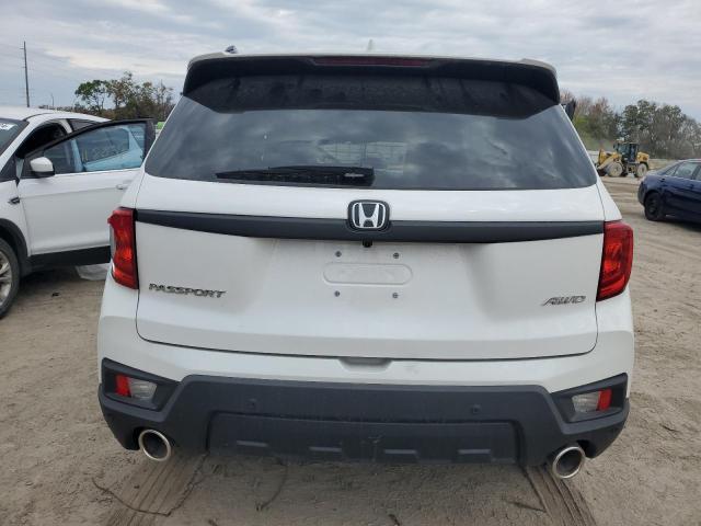 5FNYF8H58PB023196 - 2023 HONDA PASSPORT EXL WHITE photo 6