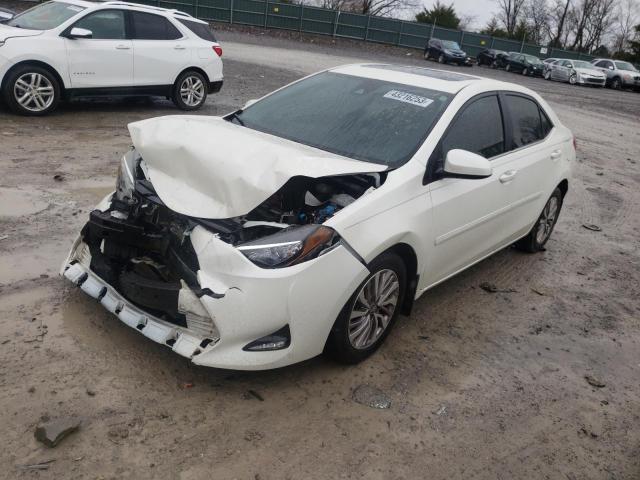 5YFBPRHE7HP629748 - 2017 TOYOTA COROLLA LE WHITE photo 1