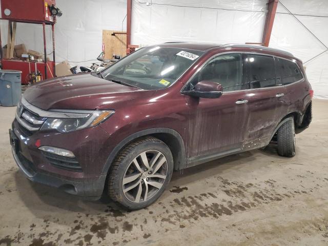 5FNYF6H91HB077609 - 2017 HONDA PILOT TOURING BURGUNDY photo 1