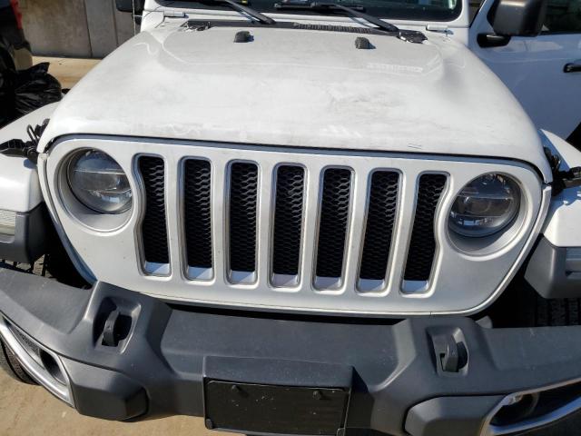 1C4HJXEG4JW174408 - 2018 JEEP WRANGLER U SAHARA WHITE photo 11