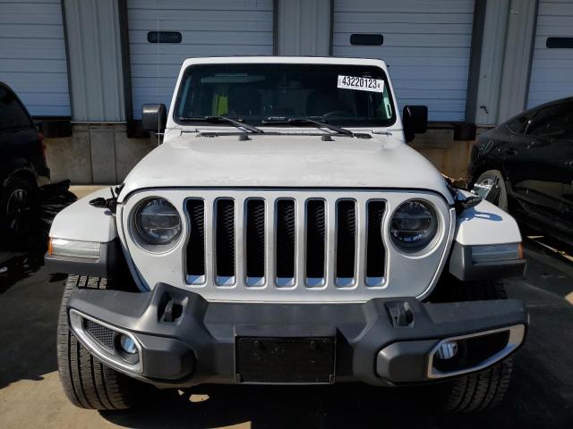 1C4HJXEG4JW174408 - 2018 JEEP WRANGLER U SAHARA WHITE photo 5