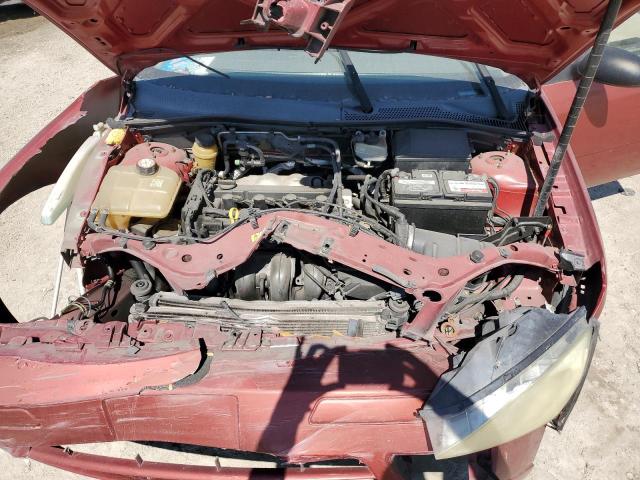 1FAFP34N15W173033 - 2005 FORD FOCUS ZX4 RED photo 11
