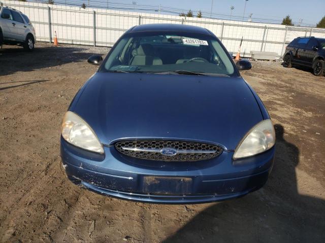 1FAFP52U72G192102 - 2002 FORD TAURUS LX BLUE photo 5