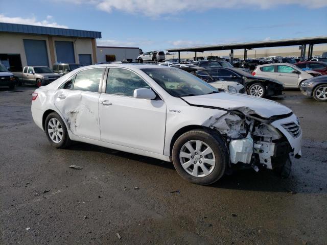 JTNBB46K593051312 - 2009 TOYOTA CAMRY HYBRID WHITE photo 4