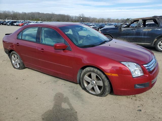 3FAFP07Z76R190520 - 2006 FORD FUSION SE RED photo 4