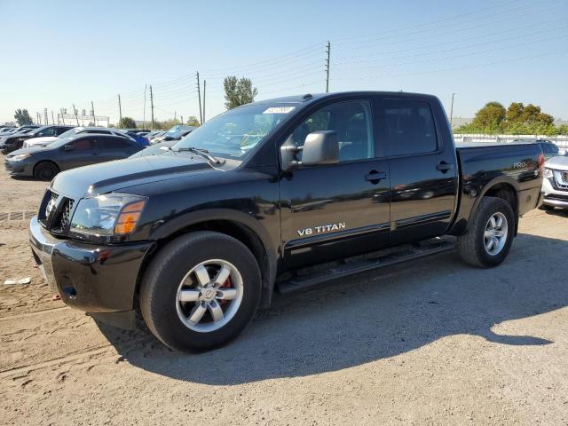 1N6AA0EC7CN325737 - 2012 NISSAN TITAN S BLACK photo 1