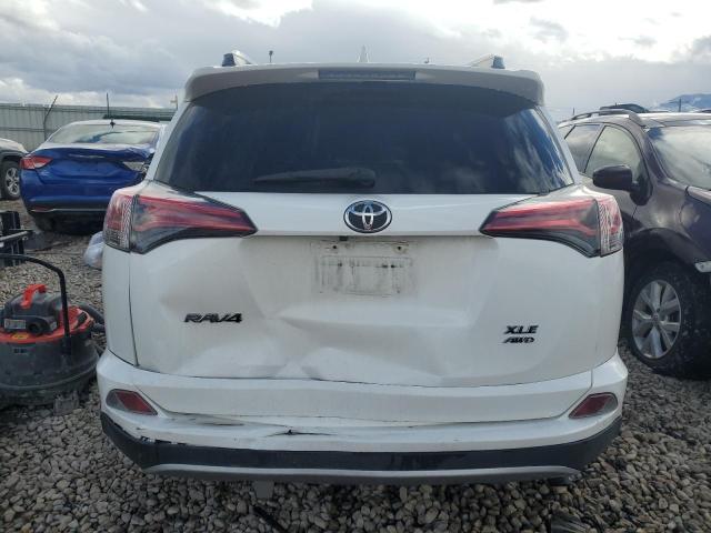 JTMRFREV2HJ172258 - 2017 TOYOTA RAV4 XLE WHITE photo 6