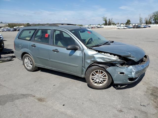 1FAFP36N45W310723 - 2005 FORD FOCUS ZXW GRAY photo 4